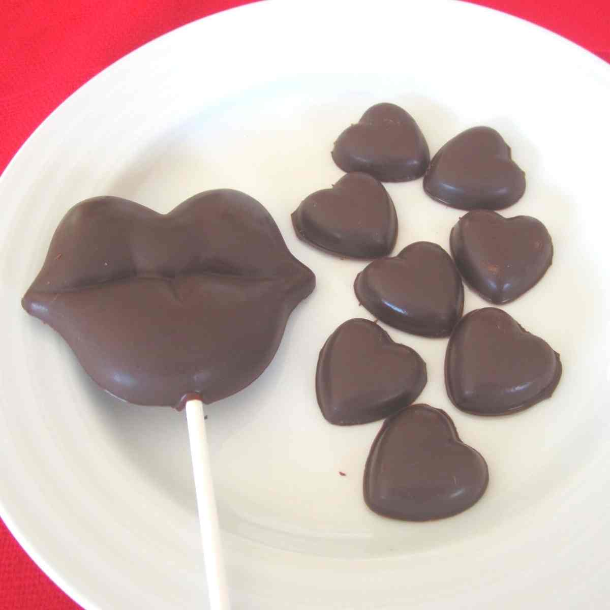 A plate with allergy free chocolate in heart and lip shapes