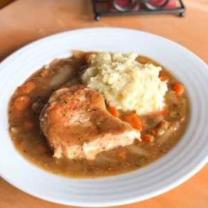 Gluten free pork chops with gravy, vegetables and mashed potatoes