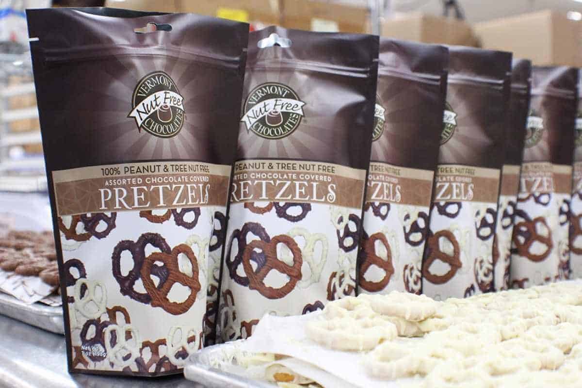 Bags of Vermont Nut Free chocolate pretzels